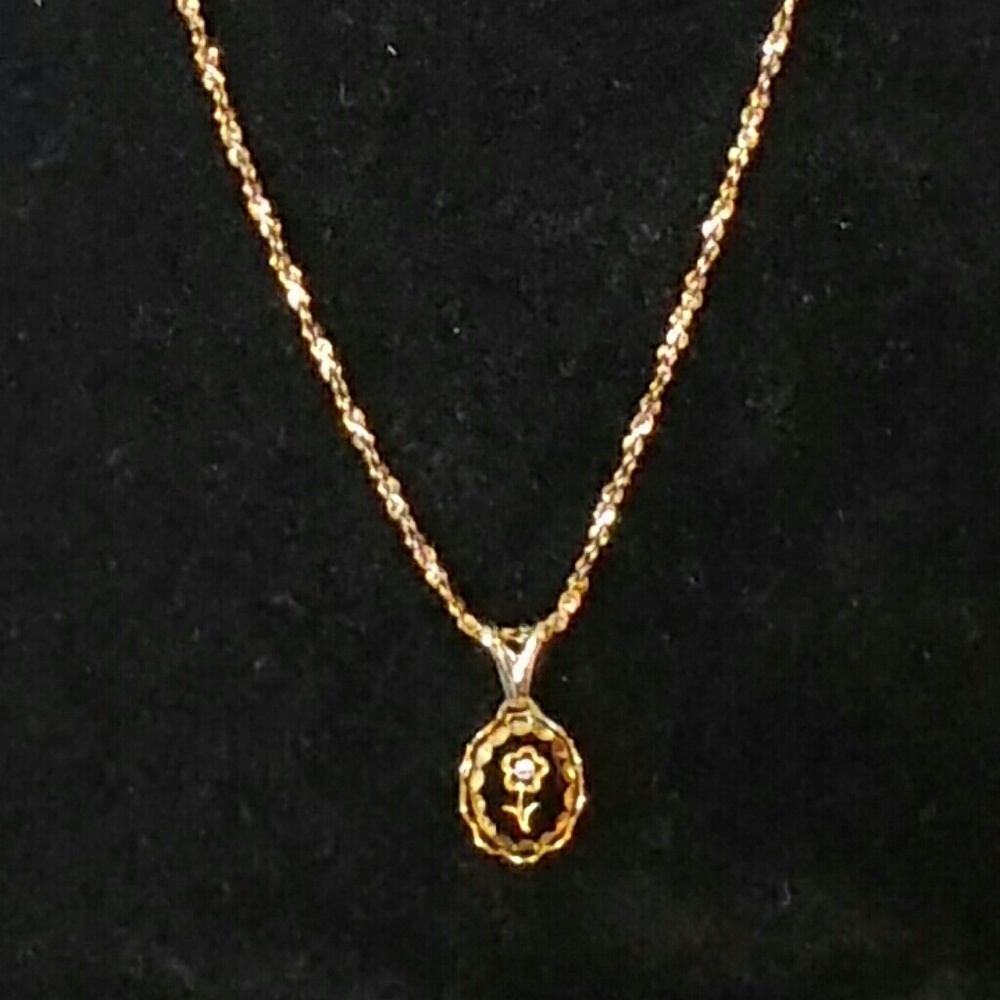 Black and goldtone flower necklace